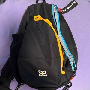 Sherpani Black Backpack with Orange and Blue Highlights
